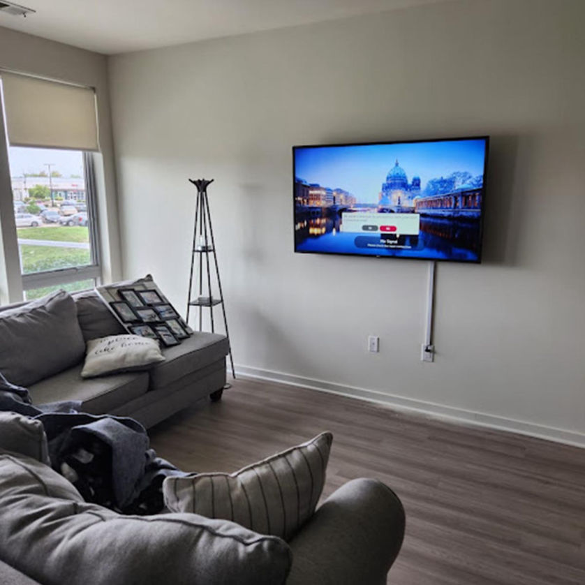 TV mounted above fireplace in Milwaukee Wisconsin home