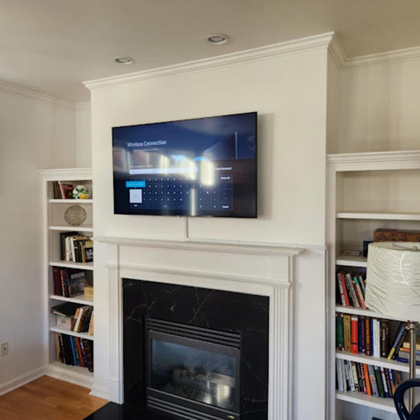 TV mounting above fireplace Milwaukee Wisconsin