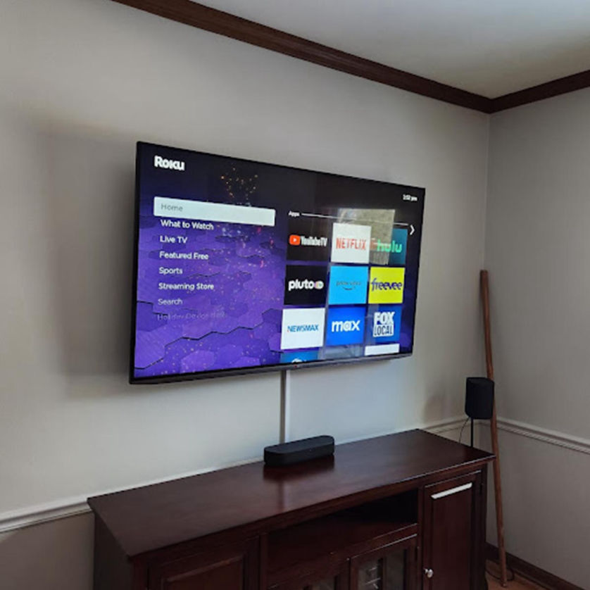 TV mounted above fireplace Milwaukee Wisconsin handyman service