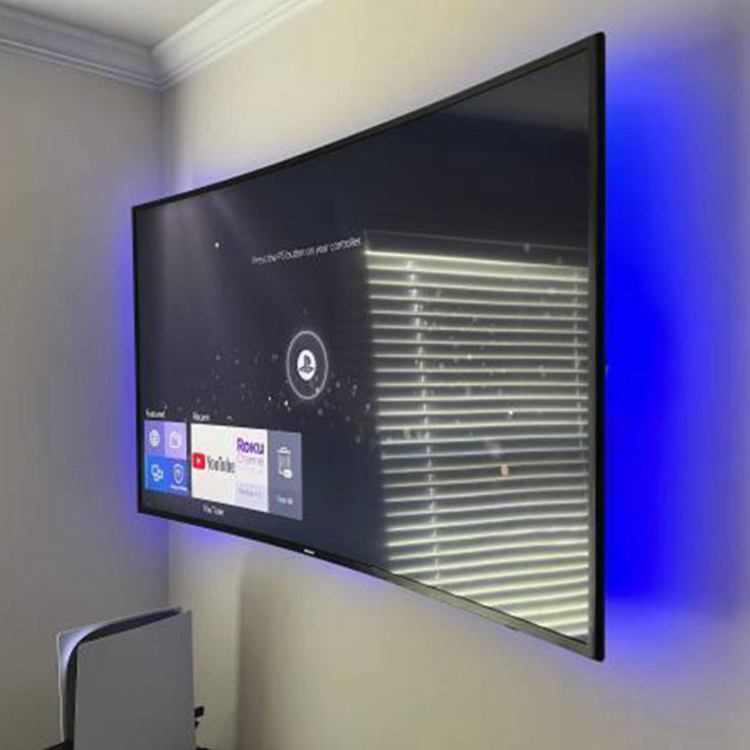 Mounted TV in living room Milwaukee WI by Handy Dandy Tech